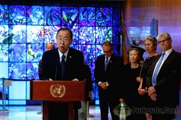 UN Secretary-General Ban Ki-Moon (front) speaks after he laid a wreath in memory of the second UN ...